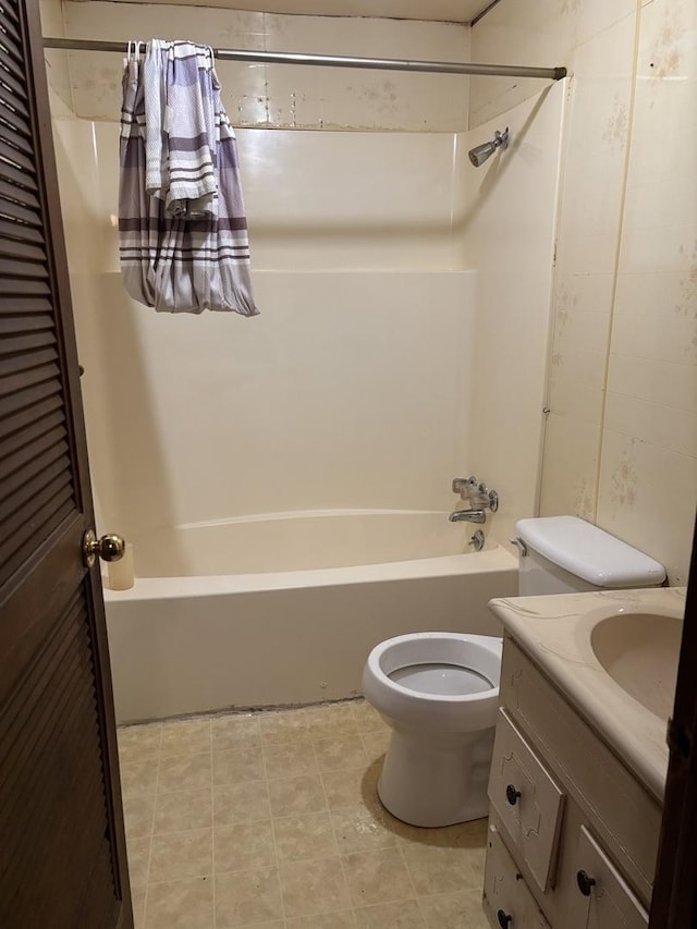 full bath featuring tile patterned floors, vanity, toilet, and shower / tub combo