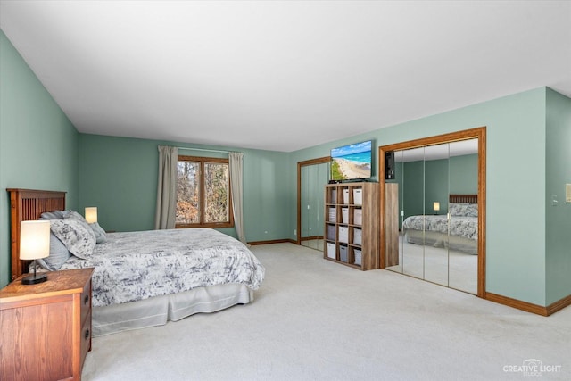 bedroom with baseboards and carpet floors