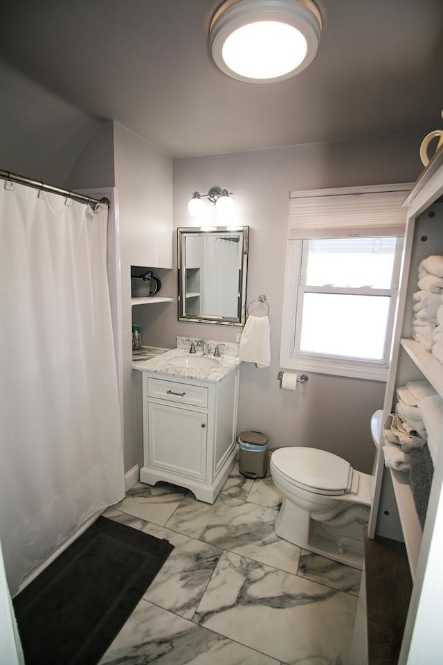 bathroom featuring vanity, baseboards, curtained shower, toilet, and marble finish floor