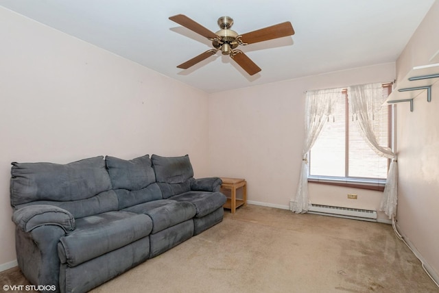 carpeted living room with a ceiling fan, a baseboard heating unit, and baseboards