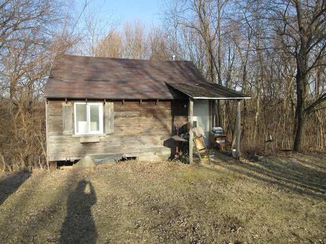 exterior space with an outbuilding