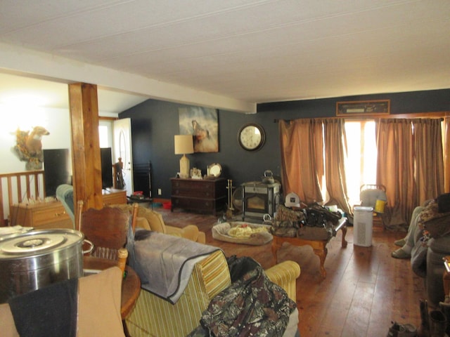 living area featuring vaulted ceiling with beams and hardwood / wood-style flooring