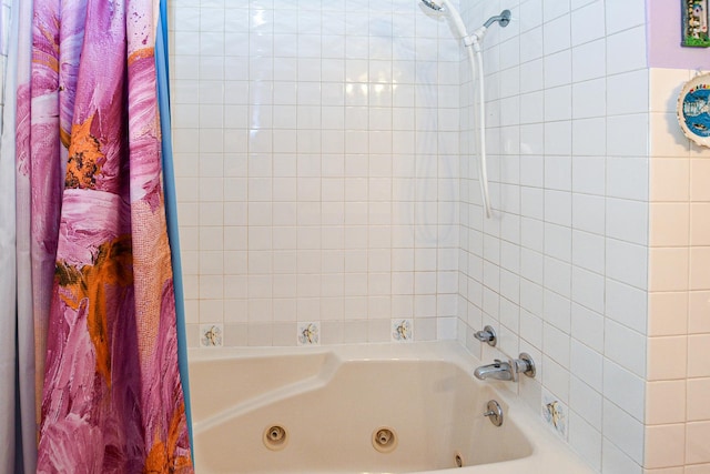 bathroom featuring a combined bath / shower with jetted tub