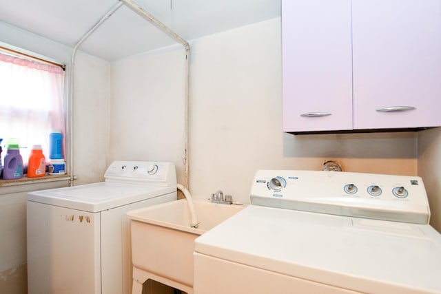 laundry room with laundry area and washer and clothes dryer