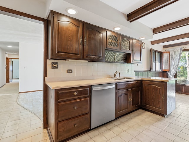 41 Mockingbird Ln, Oak Brook, IL 60523 - kitchen with dishwasher, beamed ceiling, light countertops, a sink, and backsplash