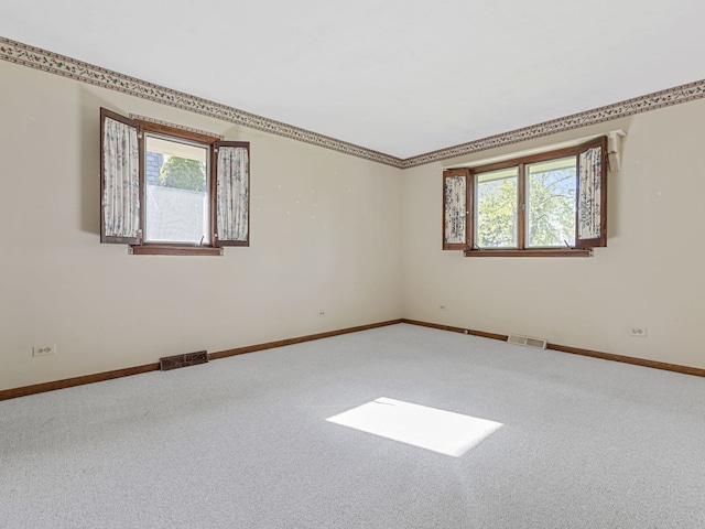 41 Mockingbird Ln, Oak Brook, IL 60523 - carpeted spare room featuring baseboards and ornamental molding