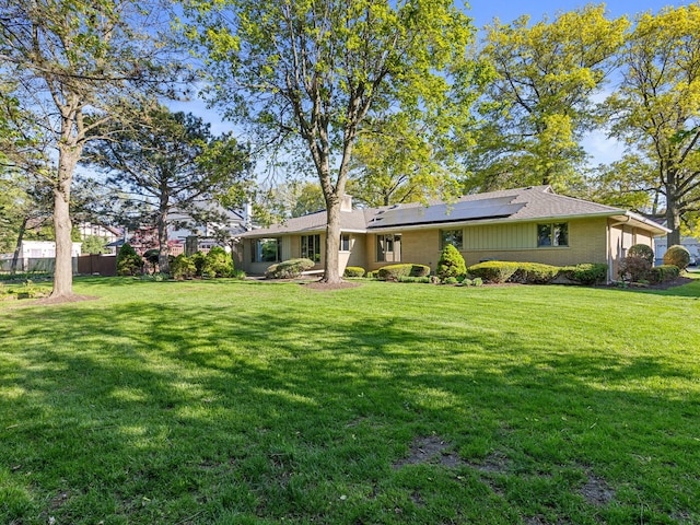 41 Mockingbird Ln, Oak Brook, IL 60523 - back of property with roof mounted solar panels and a chimney