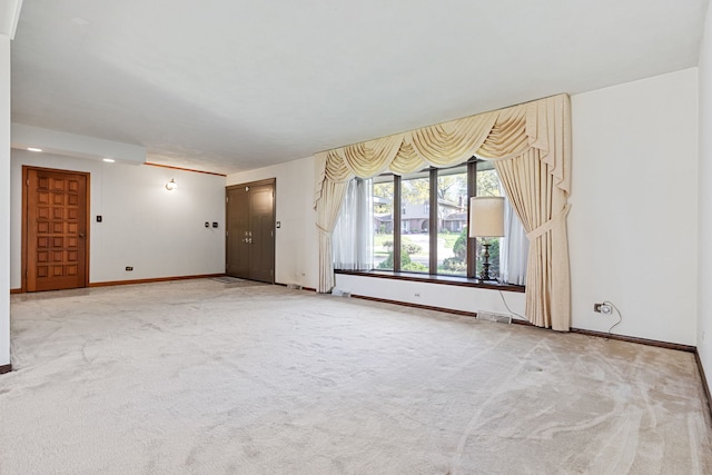 41 Mockingbird Ln, Oak Brook, IL 60523 - unfurnished living room with baseboards and carpet flooring