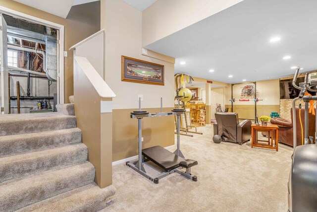 exercise room with carpet flooring, recessed lighting, and baseboards