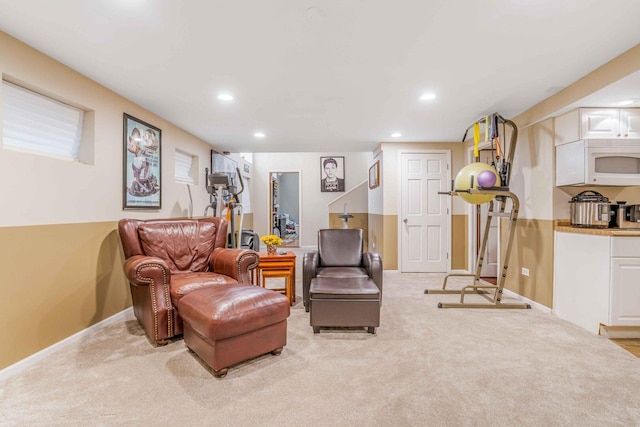 living area with recessed lighting, carpet, and baseboards