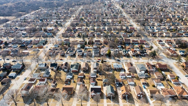 birds eye view of property with a residential view