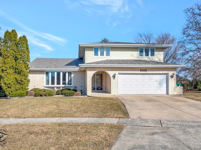 traditional-style house with brick siding, a shingled roof, concrete driveway, a front yard, and a garage