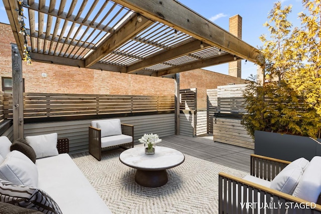 view of patio / terrace featuring outdoor lounge area and a pergola