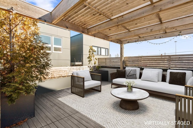 wooden deck with an outdoor hangout area