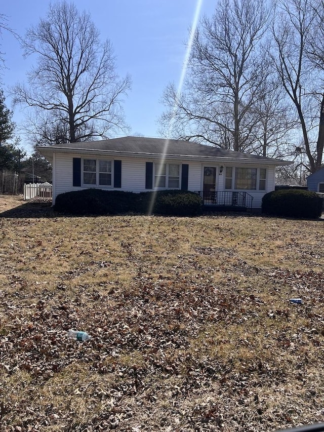 ranch-style home with covered porch