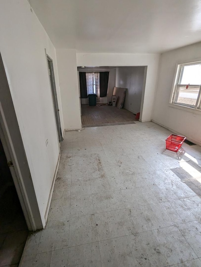 empty room with tile patterned floors