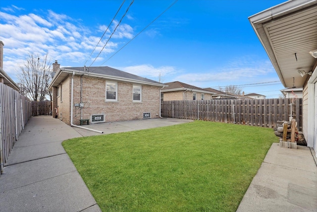 view of yard featuring a fenced backyard and a patio