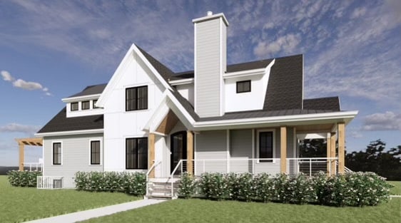 back of property with a lawn, a porch, and a chimney