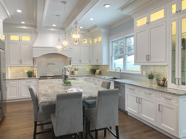 kitchen featuring white cabinetry, dark wood-style flooring, and ornamental molding