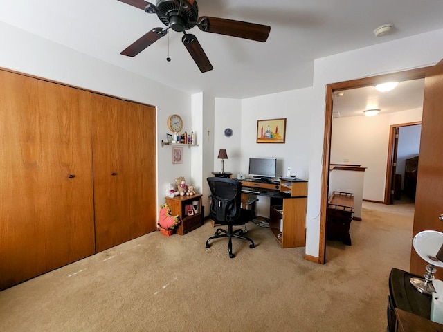 office space featuring carpet and ceiling fan