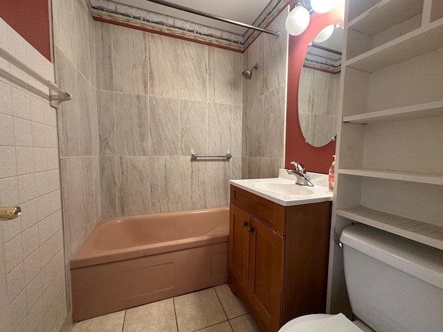 full bathroom featuring tile patterned floors, vanity, toilet, and bathing tub / shower combination