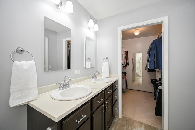 bathroom featuring double vanity and a sink