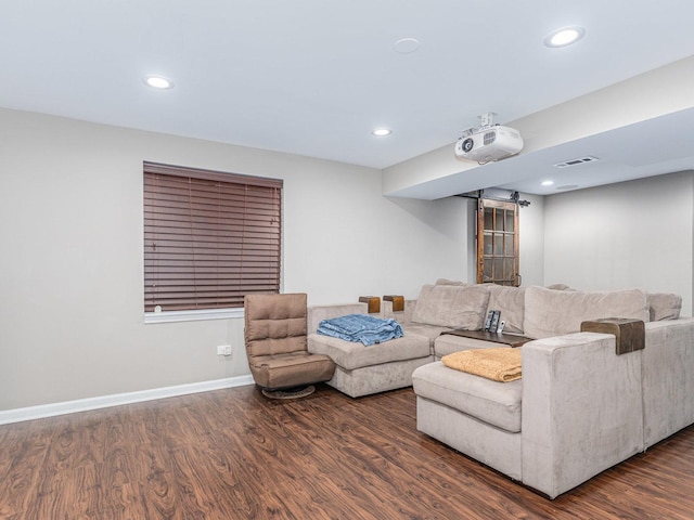 living room with recessed lighting, dark wood-style floors, visible vents, and baseboards