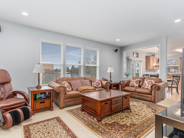 living area with recessed lighting and a healthy amount of sunlight