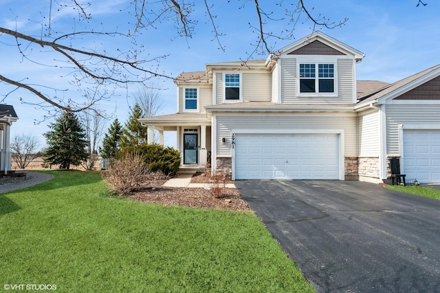 view of front of house with a garage, stone siding, a front yard, and driveway