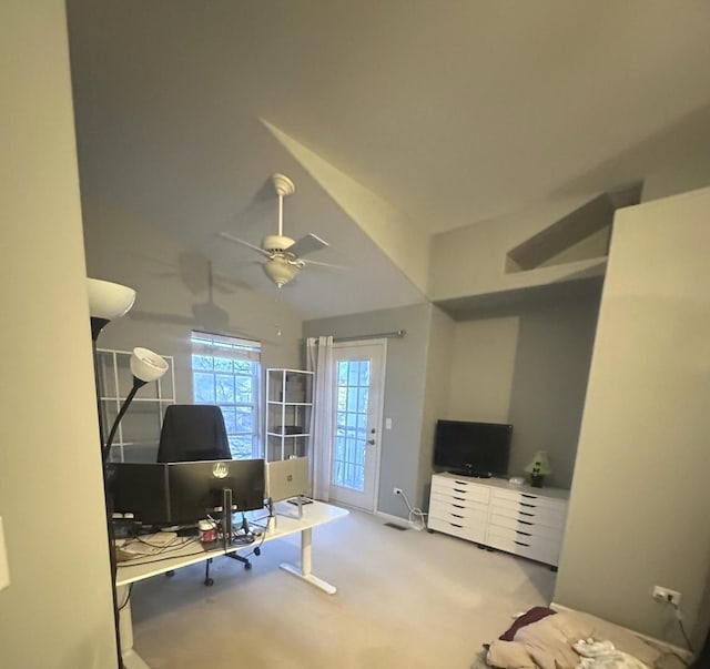 office area featuring carpet flooring, a ceiling fan, and lofted ceiling