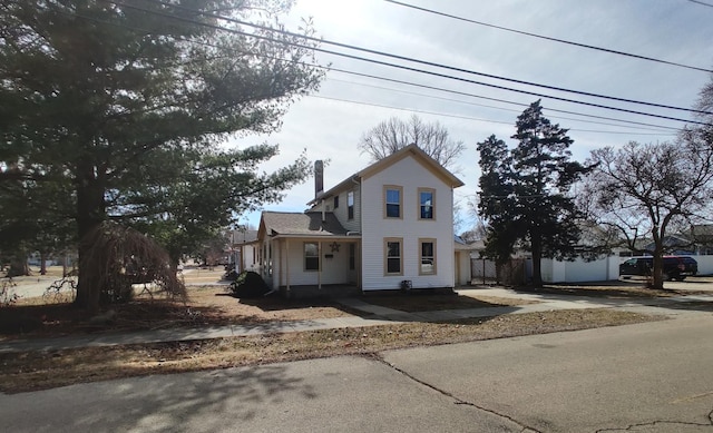 view of front of house with a chimney