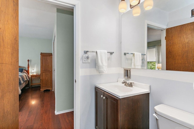 1405 Newcastle Ln, Hoffman Estates, IL 60169 - ensuite bathroom featuring wood finished floors and vanity