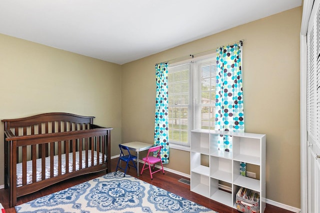 1405 Newcastle Ln, Hoffman Estates, IL 60169 - bedroom with baseboards and wood finished floors