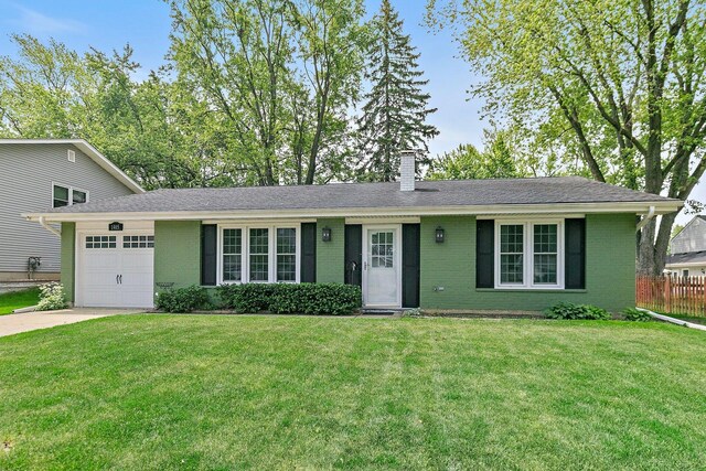 1405 Newcastle Ln, Hoffman Estates, IL 60169 - ranch-style house with an attached garage, brick siding, a chimney, and driveway