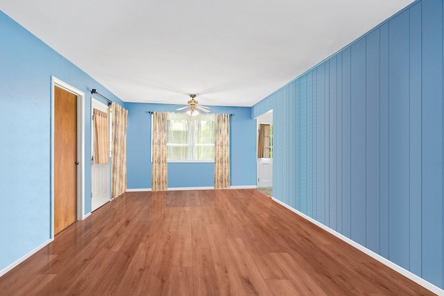 1405 Newcastle Ln, Hoffman Estates, IL 60169 - empty room featuring wood finished floors and ceiling fan
