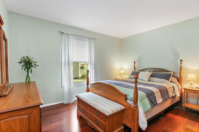 1405 Newcastle Ln, Hoffman Estates, IL 60169 - bedroom with dark wood-style flooring and baseboards