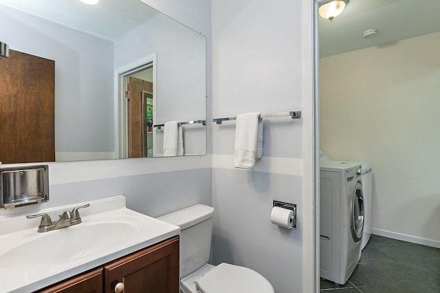 1405 Newcastle Ln, Hoffman Estates, IL 60169 - half bathroom with washer and clothes dryer, vanity, and tile patterned flooring