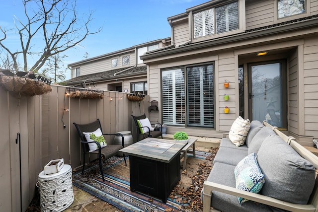 view of patio / terrace featuring fence and an outdoor hangout area