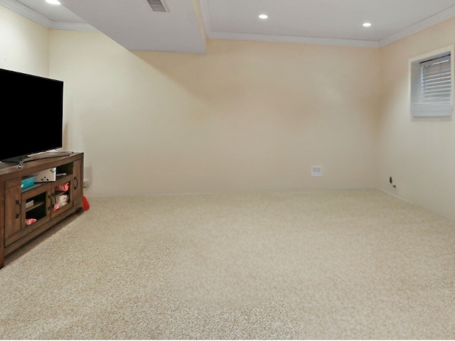 unfurnished living room with crown molding, carpet floors, and recessed lighting