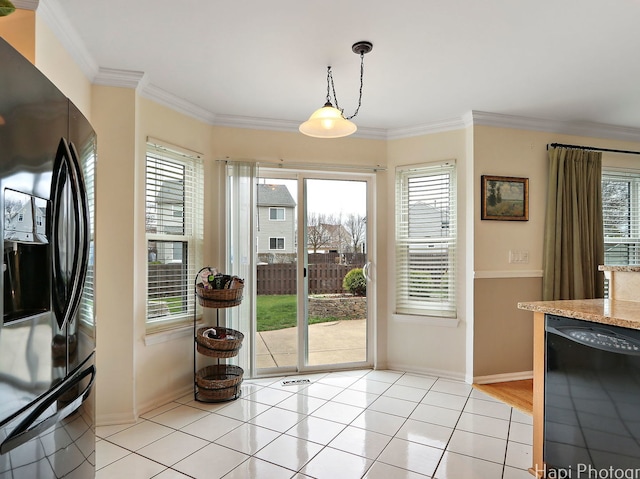 doorway with baseboards, ornamental molding, and light tile patterned flooring