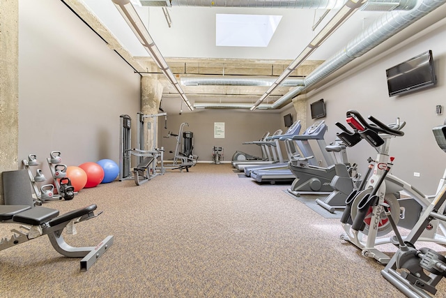 workout area featuring baseboards and visible vents