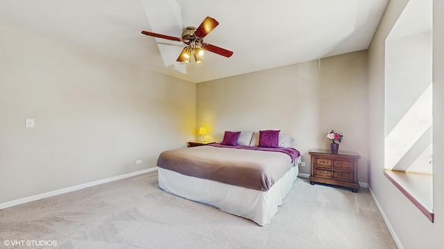 bedroom with baseboards, carpet floors, and ceiling fan