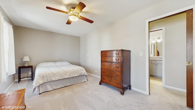 bedroom featuring baseboards, light colored carpet, and ceiling fan