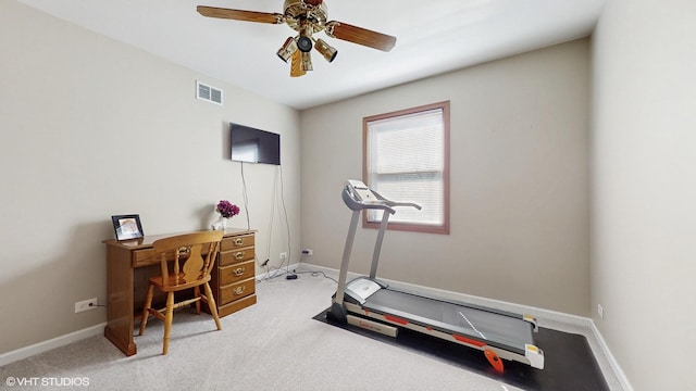 exercise room featuring visible vents, carpet flooring, baseboards, and a ceiling fan