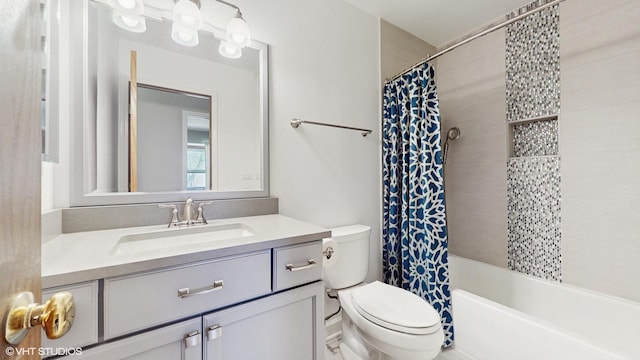 full bathroom with toilet, vanity, and shower / bath combination with curtain