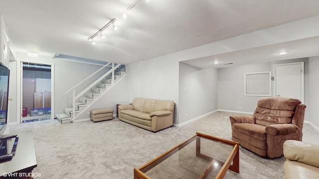 living room with recessed lighting, rail lighting, carpet flooring, baseboards, and stairs