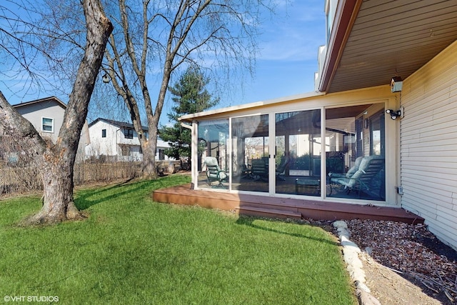 view of yard with a sunroom