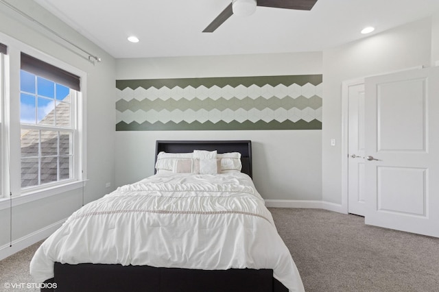 carpeted bedroom featuring recessed lighting, baseboards, and ceiling fan