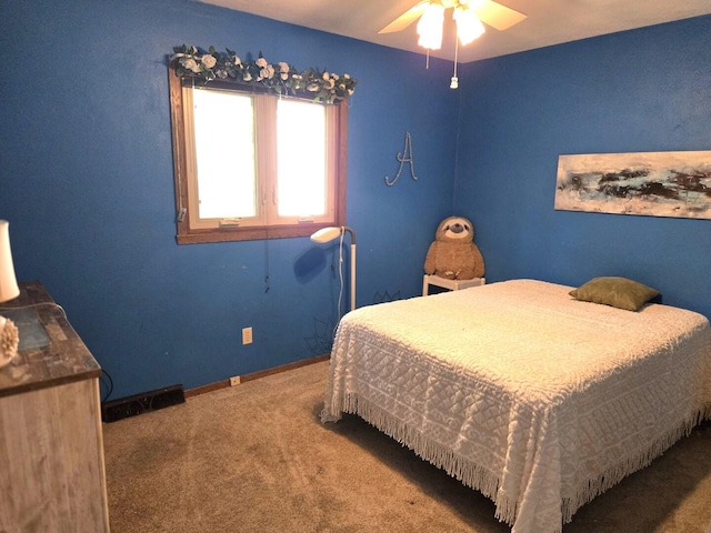 carpeted bedroom featuring visible vents, ceiling fan, and baseboards