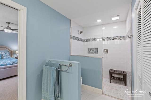 full bath featuring connected bathroom, tile patterned floors, a walk in shower, toilet, and a closet